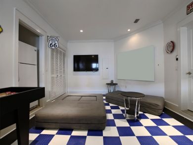 Wall Mounted TV in Games Room